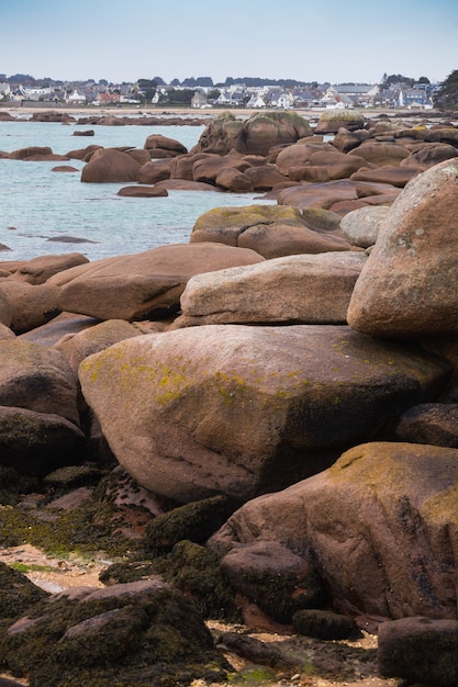 Typical Brittany coast at  the Tregastel in the north of France. pink rocks