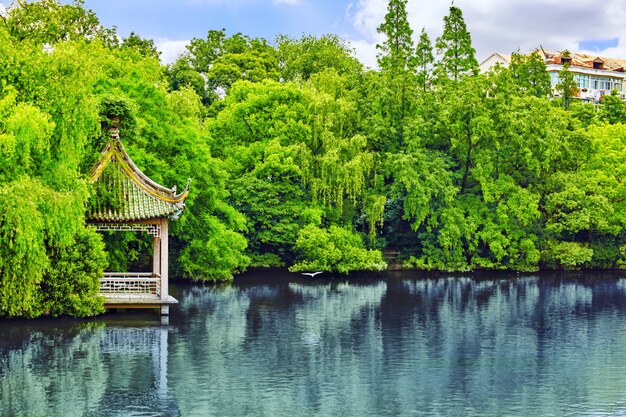 Typical Chinese garden,  park with bizarre rocks. Beijing.