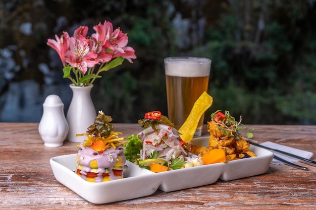 Typical food of Peru, white fish ceviche. at the table of a Peruvian restaurant.