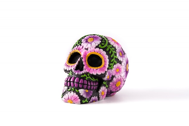 Typical Mexican skull painted isolated on white . Dia de los muertos.