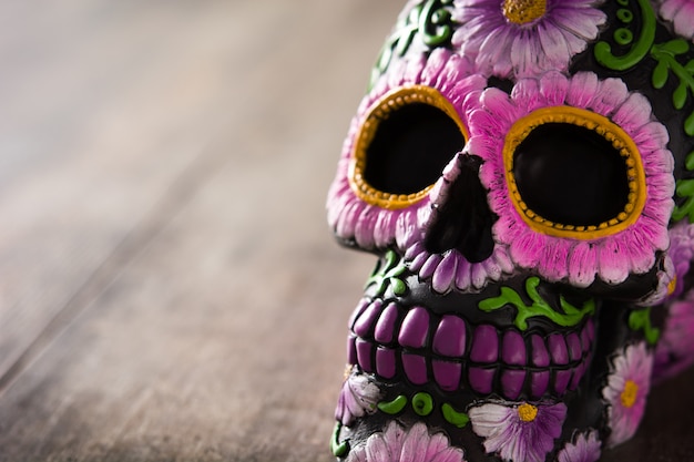 Typical Mexican skull painted on wooden table