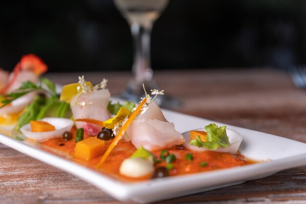 Typical Peruvian dish, fish tiradito in different sauces.