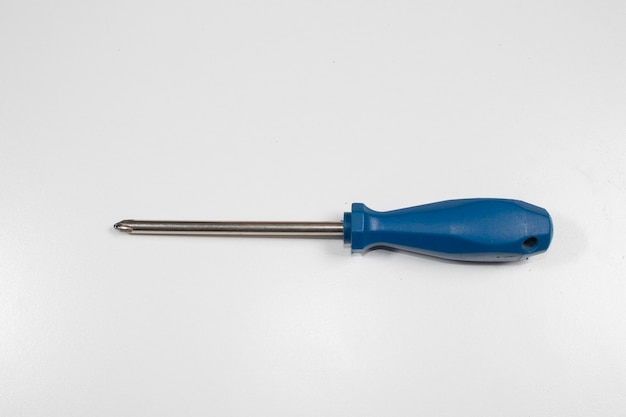 A typical Phillips screwdriver has a collored handle and on white