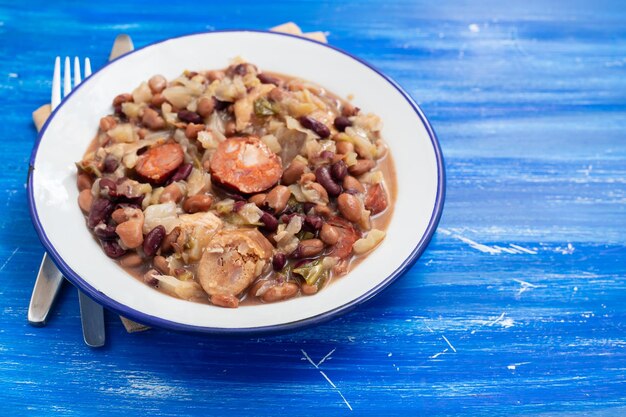 Typical portuguese meat and sausages stew in dish