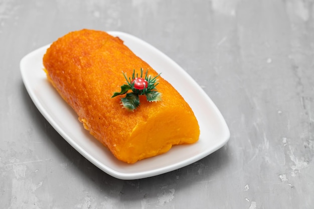 Typical portuguese orange cake on white dish