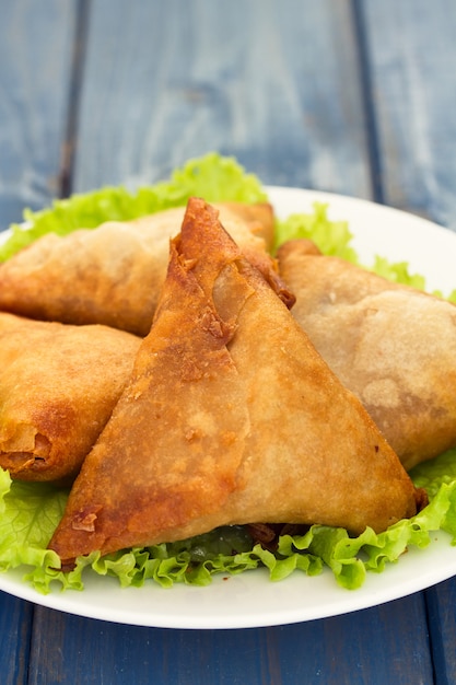 Typical portuguese snack chamucas on plate