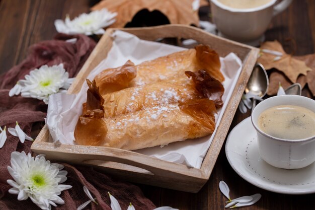 Typical portuguese sweets Pasteis de Tentugal with coffee