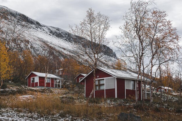 Typical red wooden houses near Saana Mountain in Finland