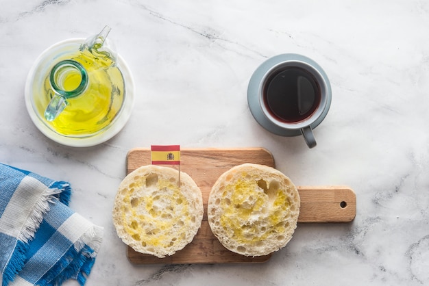 typical spanish breakfast with coffee and bread with oil