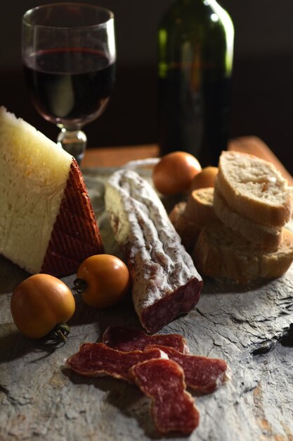 Typical spanish foodtomatowinebread cheese and sausage