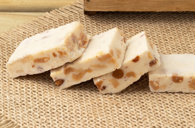 Typical sweet nougat on jute