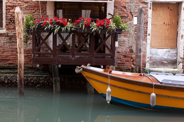 Typical wooden boat in the Venice canal