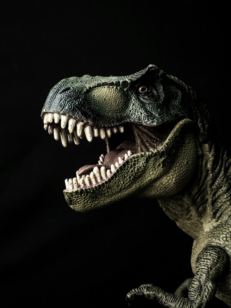 Foto tyrannosaurus t-rex dinosaurus op zwart