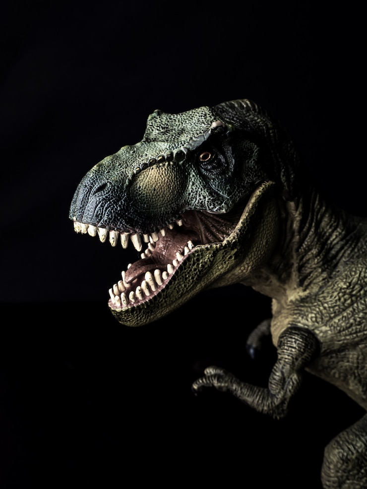 Foto tyrannosaurus t-rex dinosaurus op zwarte achtergrond