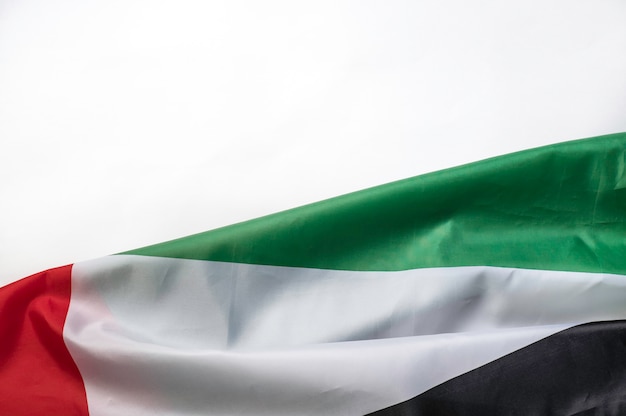 UAE flag on a white background with space for text on top