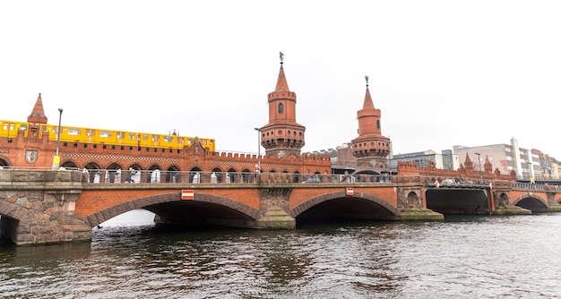 UBahn train passing over Oberbaum Bridge in Berlin Germany