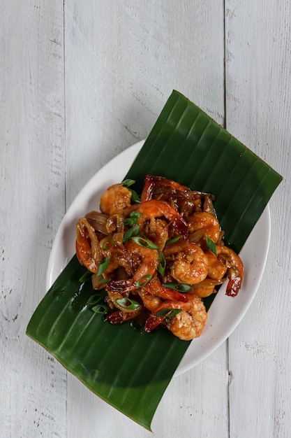 Udang Saus Tiram or fried prawns or shrimp in oyster sauce