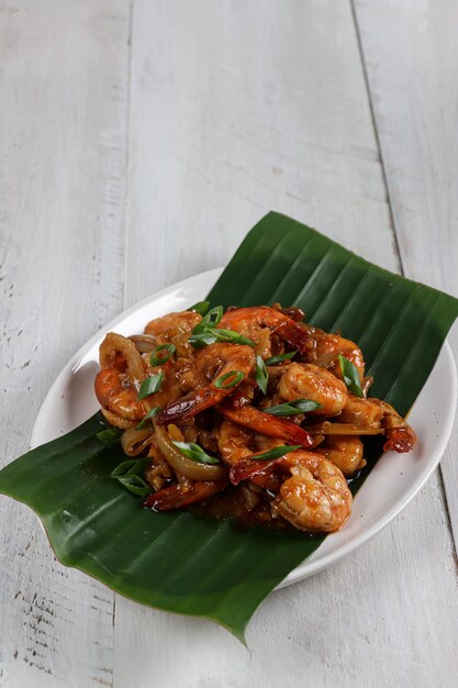 Udang Saus Tiram or fried prawns or shrimp in oyster sauce