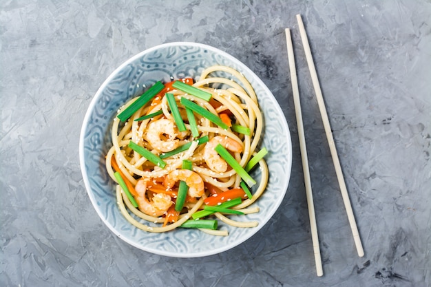 Udon and wok noodles with prawns