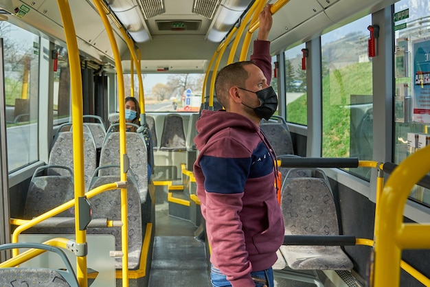 Ugly Man and ugly woman in to the bus with mask