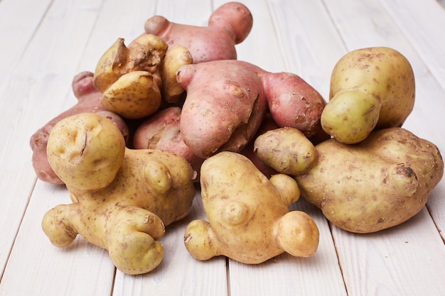 Photo ugly organic abnormal vegetables, weird potatoes