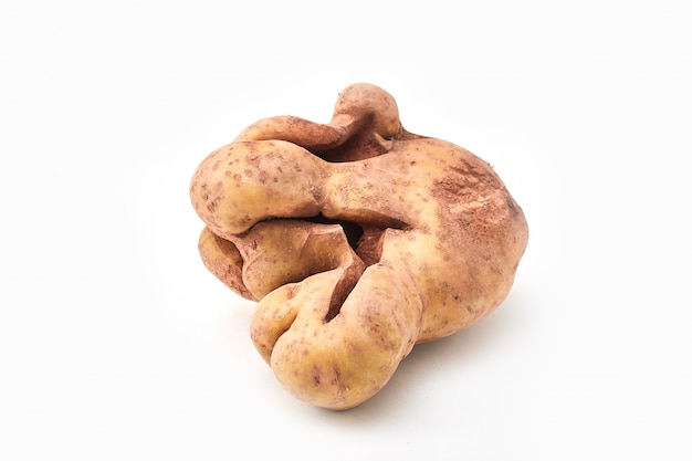 Ugly potato isolated on a white 