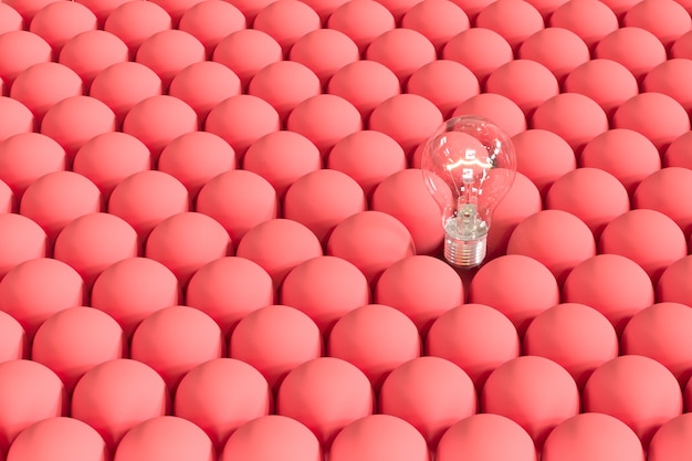 Uitstekende gloeilamp op zwevend tussen rode gloeilampen.