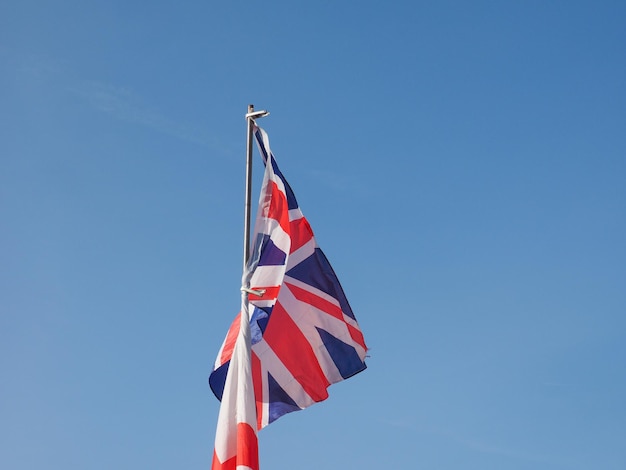 UK Flag over blue sky