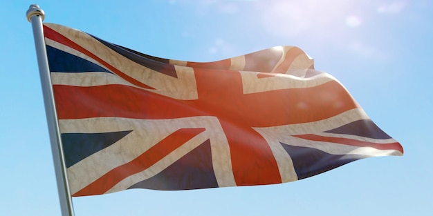 UK United Kingdom flag waving on blue sky background sunny day