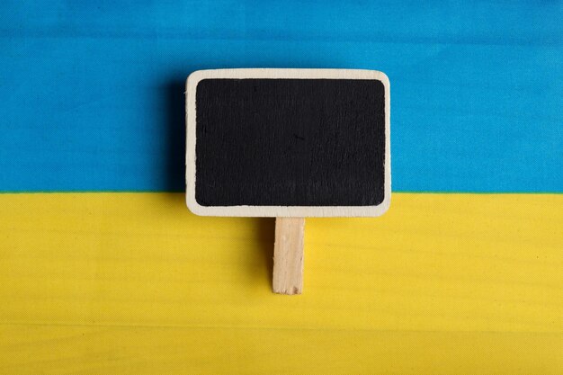 Ukraine Flag and blank blackboard Copy space