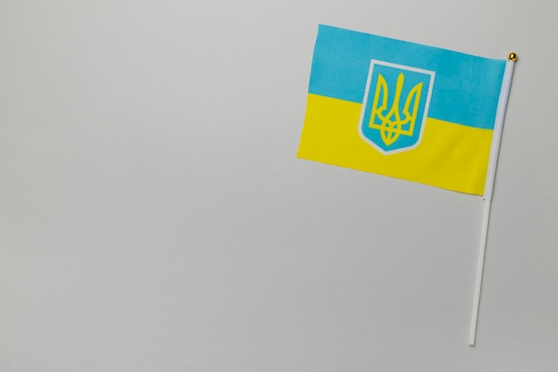 ukraine flag on color background top view