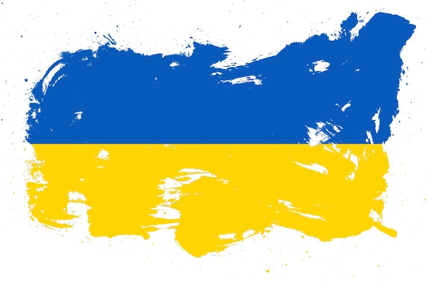 Photo ukraine flag with painted grunge brush stroke effect on white background