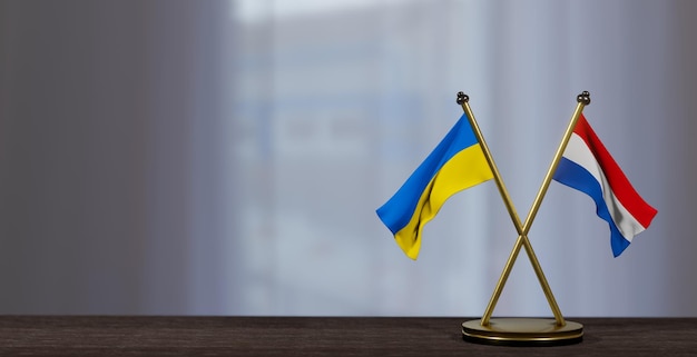 Флаги Украины и Нидерландов на столе Переговоры между Нидерландами и Украиной