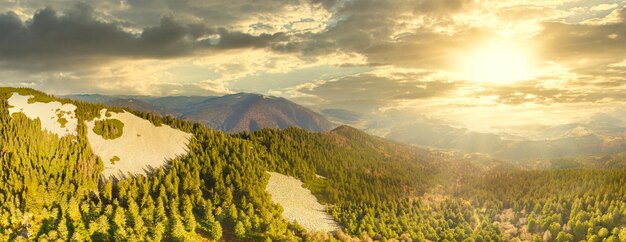 Ukraine Sunrise shines in the Carpathians colored fog spreads over the valleys and lowlands of the mountain range golden prairies are very dazzlingly beautiful