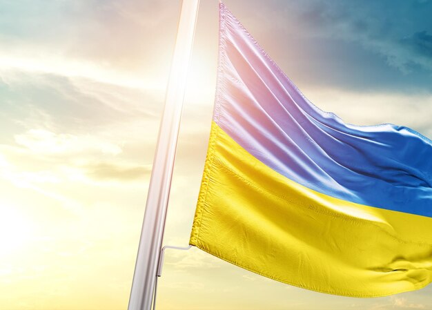 Ukraine waving flag in beautiful sky.