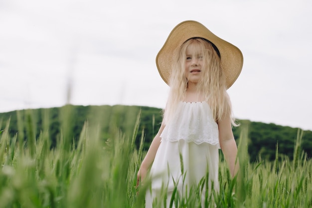 Ukrainian 7 year old girl in a wheat field