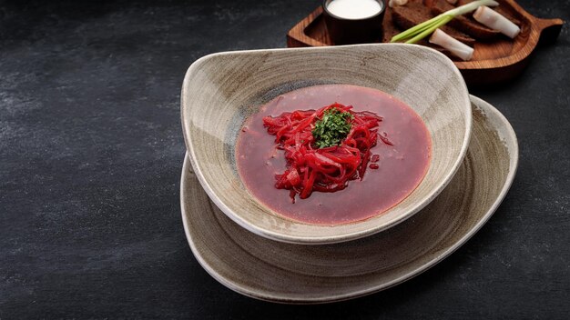 Ukrainian borscht with sour cream onion and lard