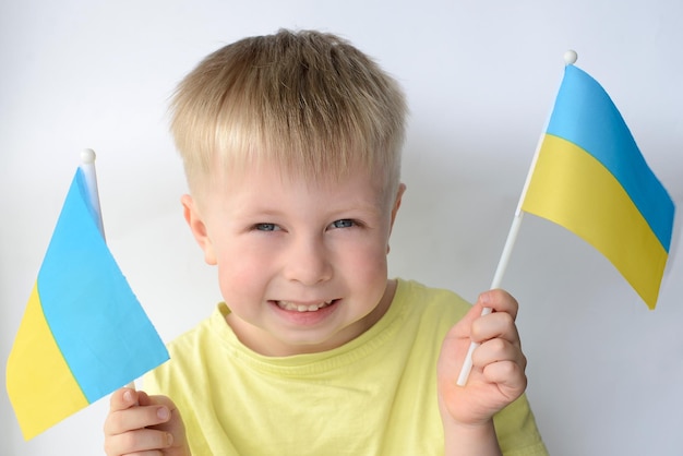 Ukrainian boy with the flag of Ukraine