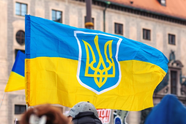 ukrainian flag with trident at peaceful demonstration ukraine flag winding