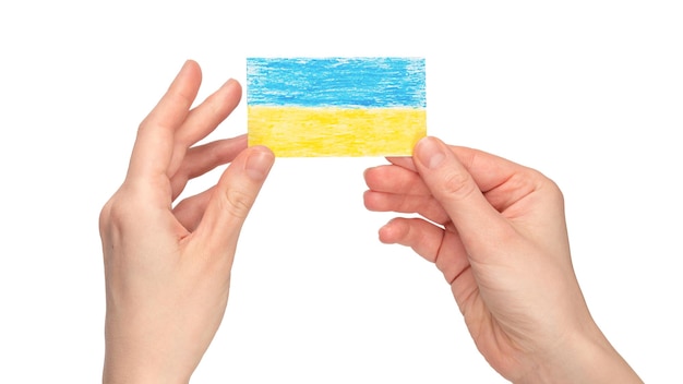 Ukrainian flag in woman hands isolated on a white background Stop war