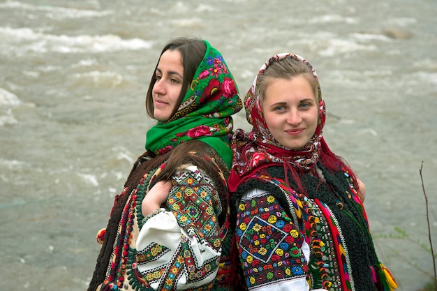 Ukrainian girls dressed in ancient picturesque Hutsul national clothes.