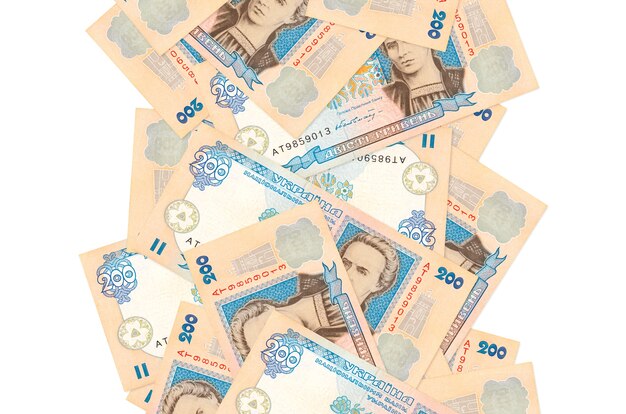 Photo ukrainian hryvnias bills flying down isolated on white