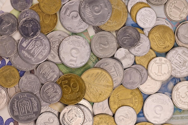 Ukrainian kopiika coins close up Big amount of ukrainian money on table Business and stock concept