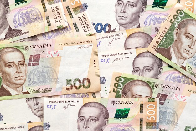 Ukrainian money currency of denominations scattered Hryvnia banknotes 500 background