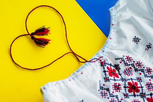 Ukrainian national colors, sunflower against embroidered cloth