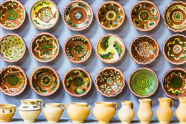 Ukrainian pottery. pottery market in ukrainian village\
oposhnya, center of ukrainian pottery product