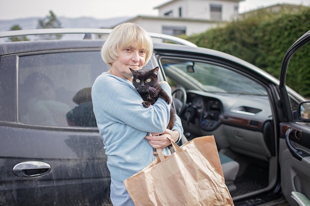 Ukrainian refugees flee from russian invasion cross board by car together with pet seek protection