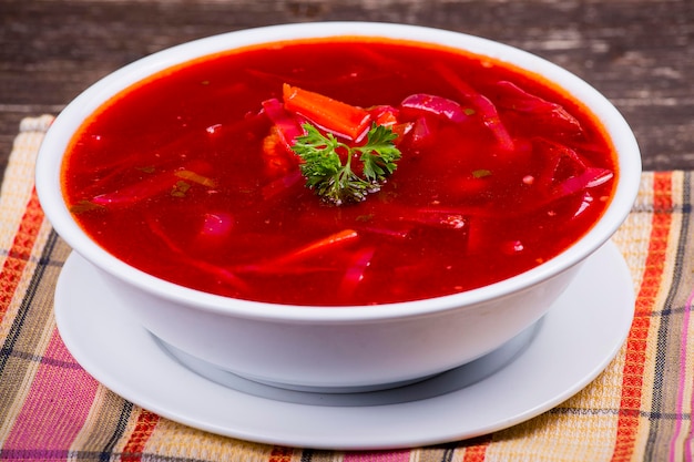 Ukrainian and russian national food red beet soup borscht Close up