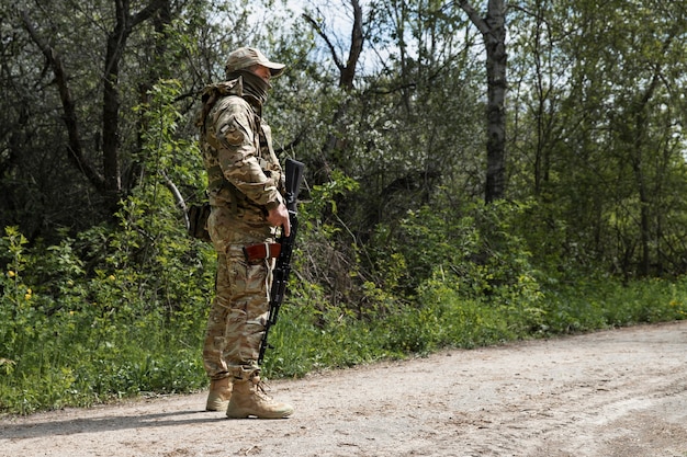 Ukrainian soldier in uniform full shot