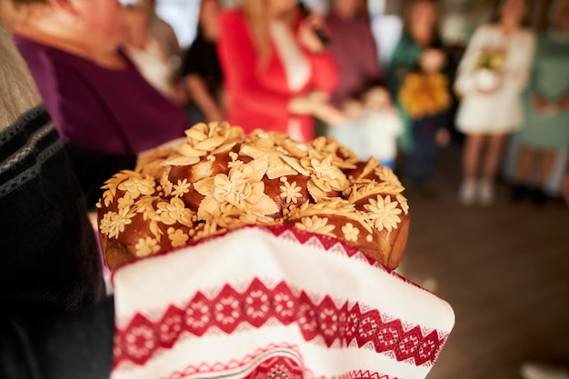 Ukrainian traditional festive fresh loaf with salt. Ukrainian wedding traditions.